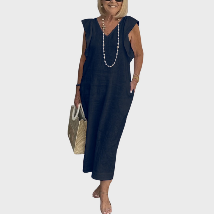Versatile women's pocket maxi dress with ruffle shoulders and V-neck, suitable for summer casual wear.