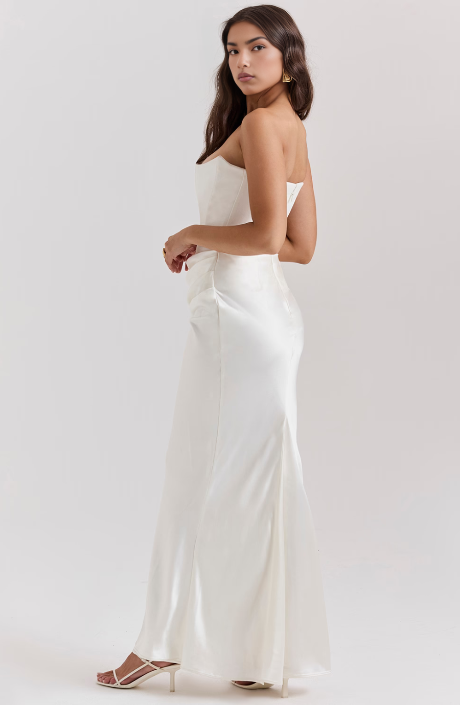 Women's strapless black evening dress. Corset maxi style for a refined formal event look.