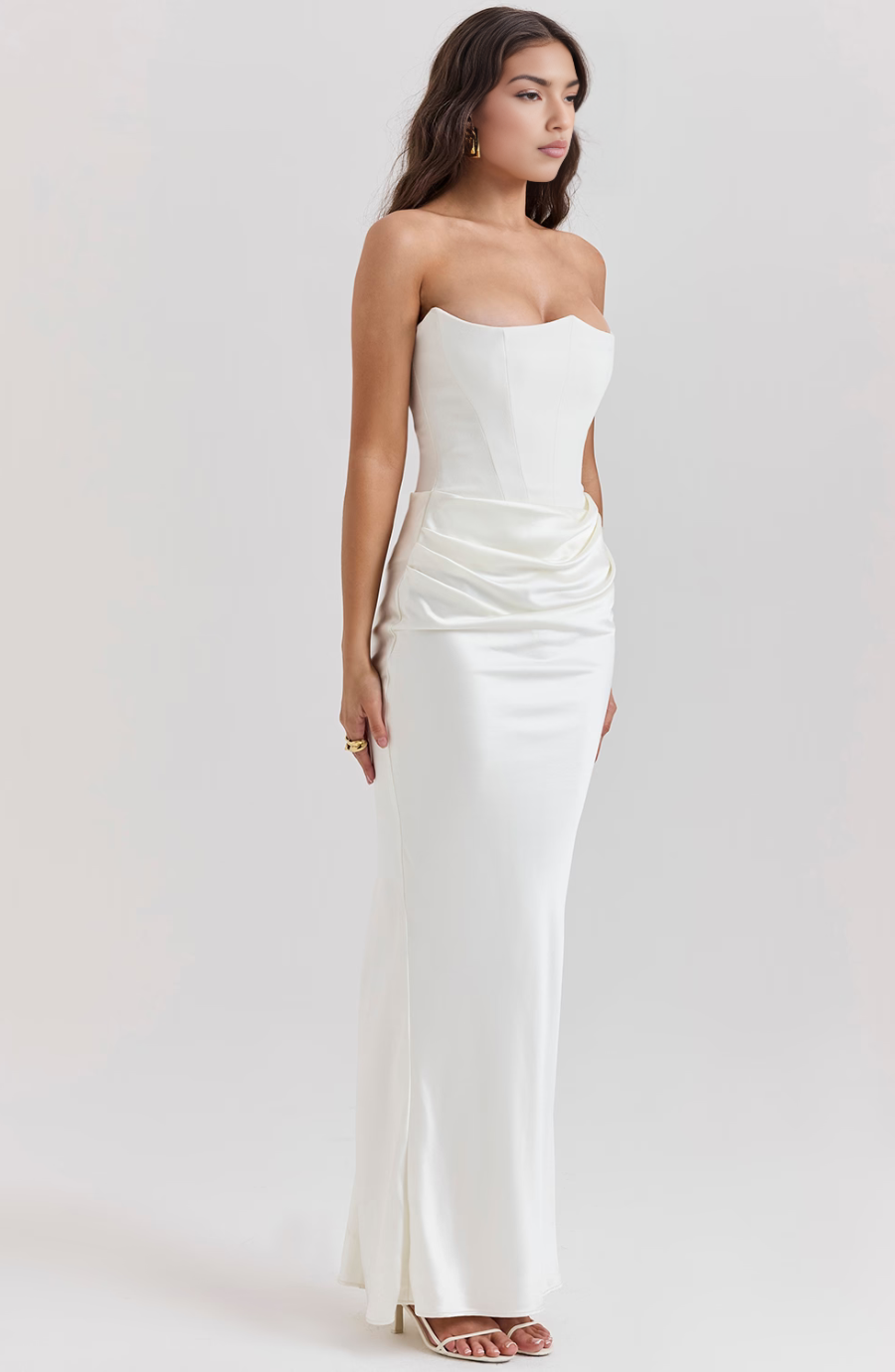 Elegant black strapless evening gown, featuring a figure-flattering corset and maxi length.