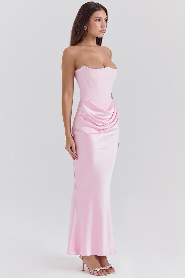 Beautiful black strapless formal maxi dress with corset detailing for a special occasion.