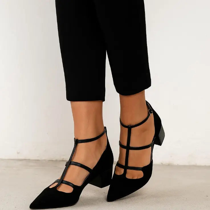 Sophisticated women's black strappy pointed toe flats, perfect dress shoes for versatile fashion and comfort.