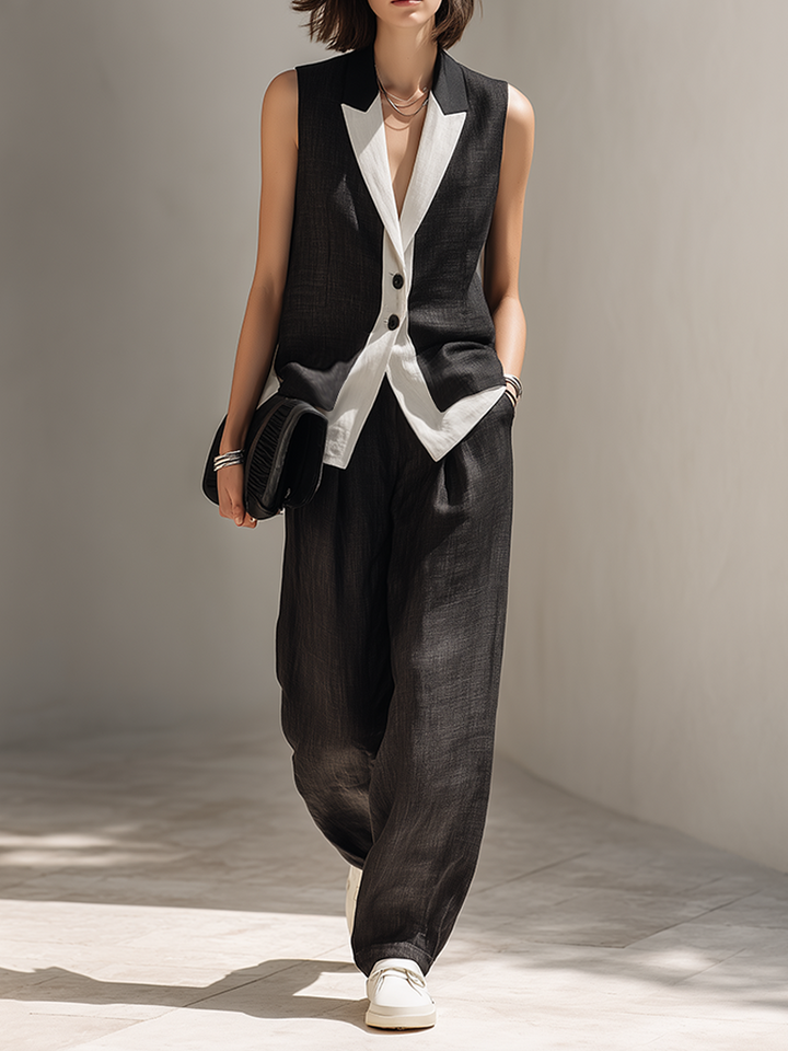 Elegant black two-piece set for women, featuring a stylish vest and chic wide-leg pants. Perfect for office or formal wear.