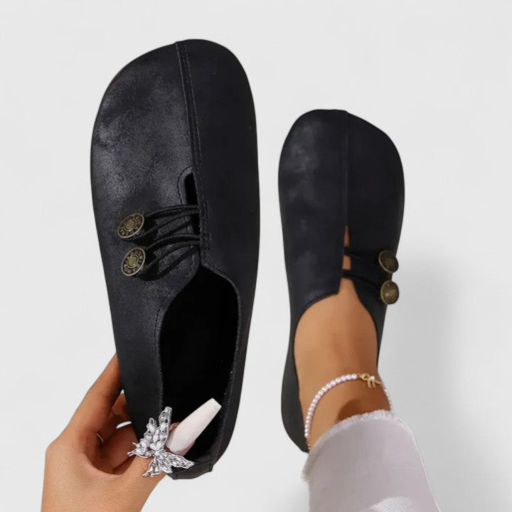 Comfortable women's slip-on loafers, foldable for travel, featuring an elegant design & elastic button.