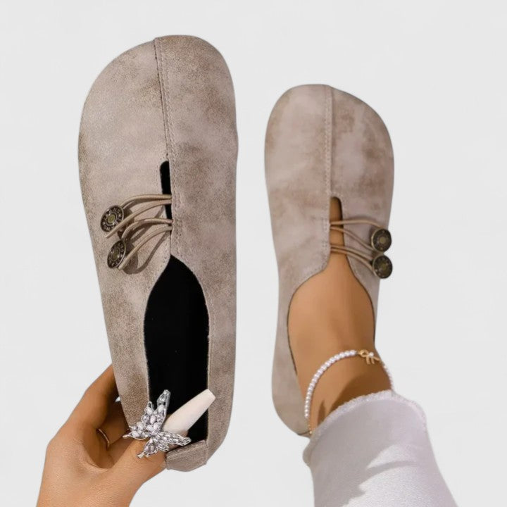 Women's comfortable loafers with elastic button detail, foldable design perfect as travel shoes or elegant flats.