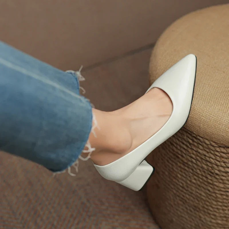 Comfortable women's pointed toe block heels, non-slip and versatile for professional attire.