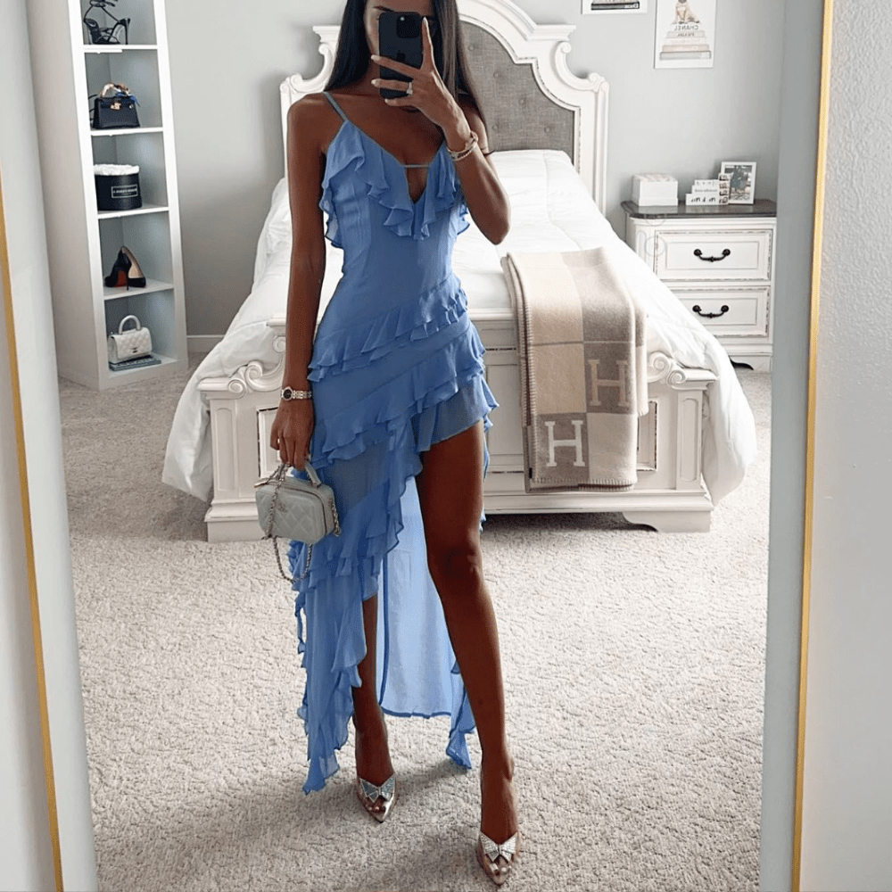 Stylish women's blue V-neck maxi dress with an elegant asymmetrical ruffle design. Great for special events.