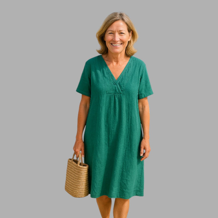 Black women's midi dress, an elegant and comfortable choice for versatile occasion wear with a flattering fit.