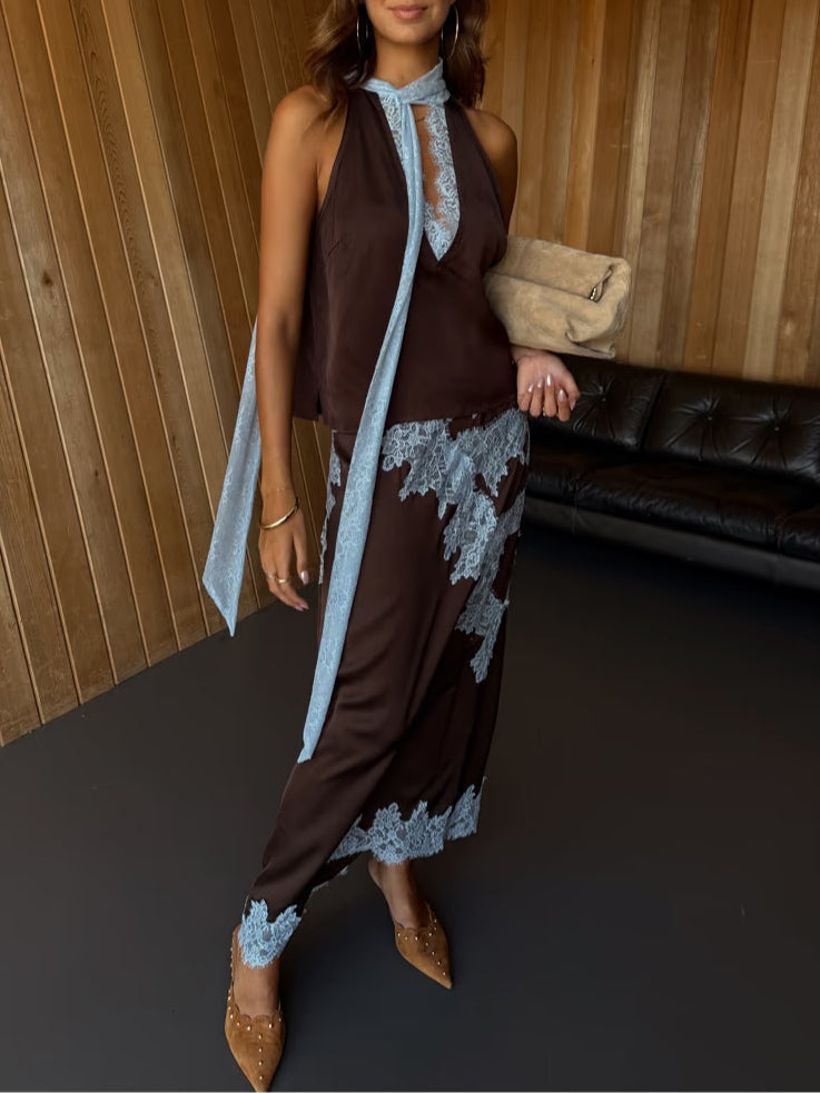 Stylish women's brown tie-dye maxi dress, a halter design with an elegant side slit, great for resort. (95 characters)