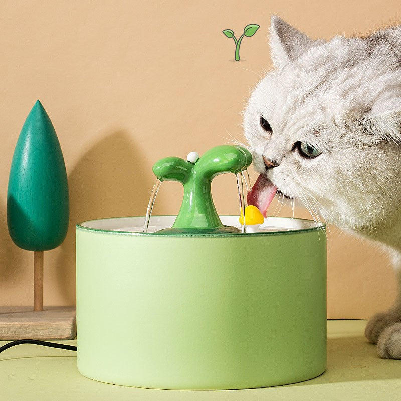 Detailed view of a pet ceramic water fountain with a visible water level indicator, easy to monitor.