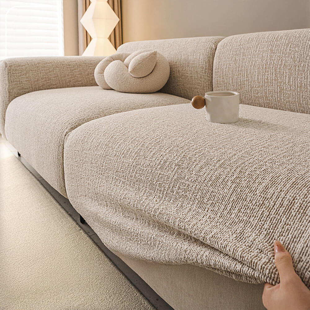 Sophisticated chenille sofa cover in a modern living space, adding elegance and furniture protection