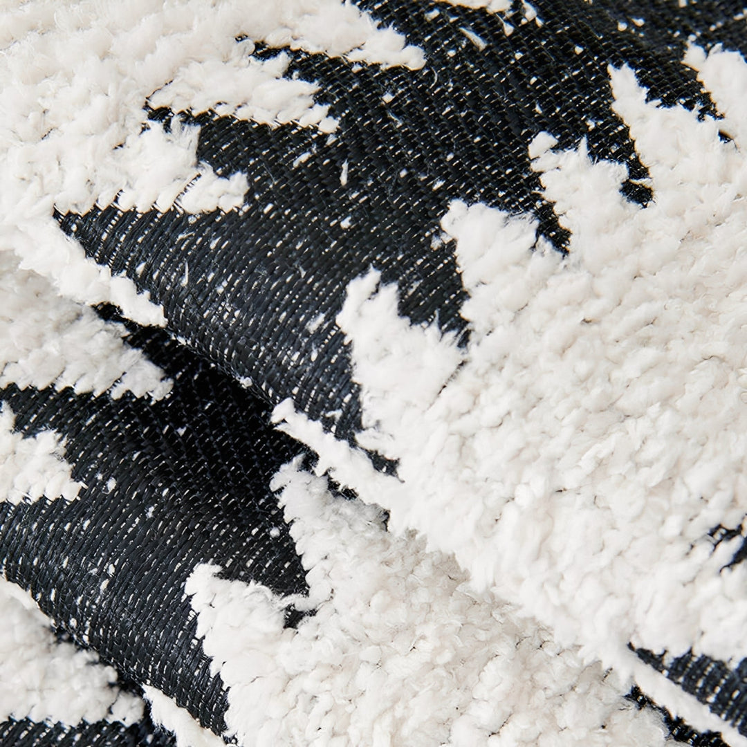 Close-up of soft chevron chenille fabric on a sofa cover, ideal pet friendly protector