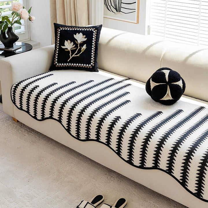 Texture shot of the chevron pattern on the chenille sofa cover, a premium pet protector