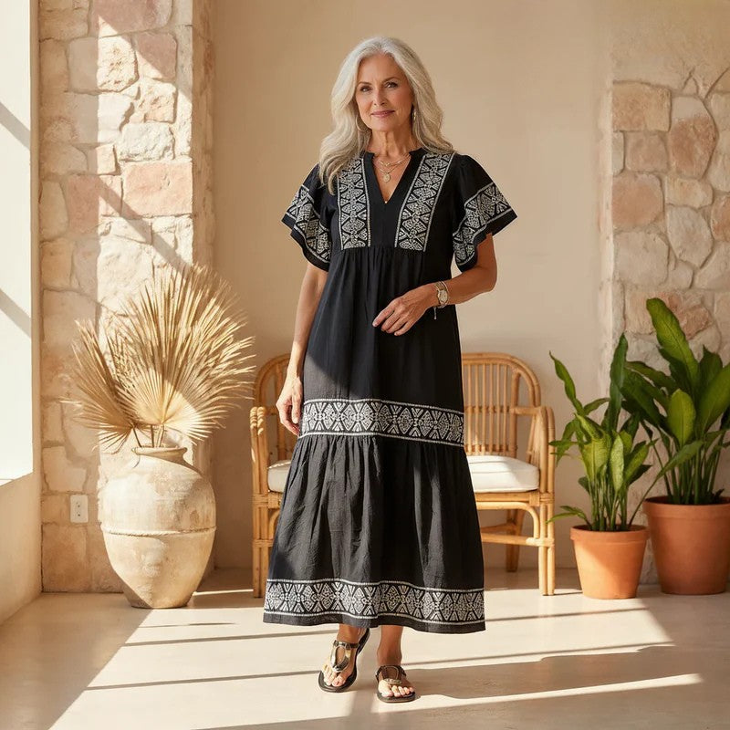 Elegant embroidered boho midi dress for women, A-line cut, long sleeves, perfect for summer casual chic.