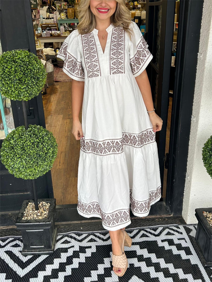 Women's chic A-line boho midi dress with long sleeves, offering a comfortable and versatile summer style.