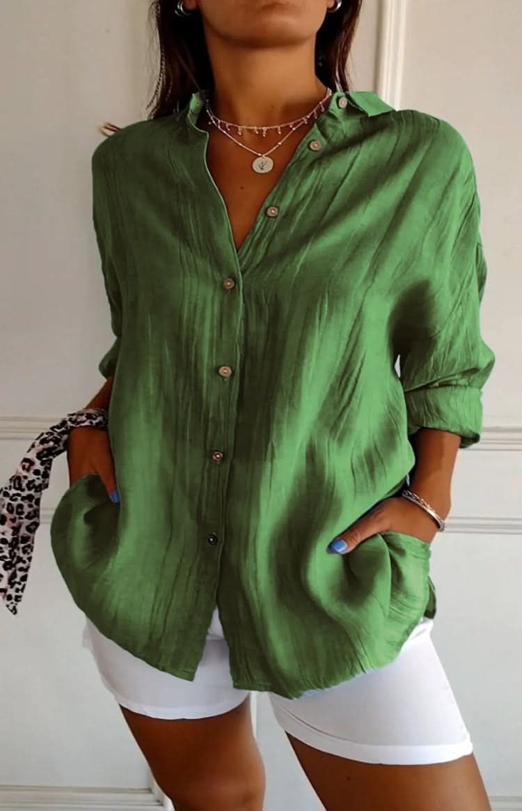 Women's long sleeve elegant blouse, versatile chic top, perfect wardrobe essential.