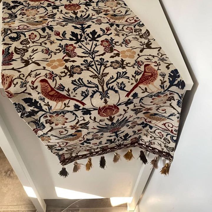 Detailed floral and bird jacquard table runner, a beautiful vintage accent for any dining table.