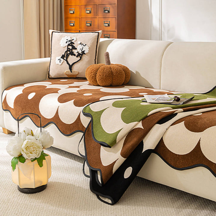 Decorative floral chenille furniture protector enhancing a living room's home decor
