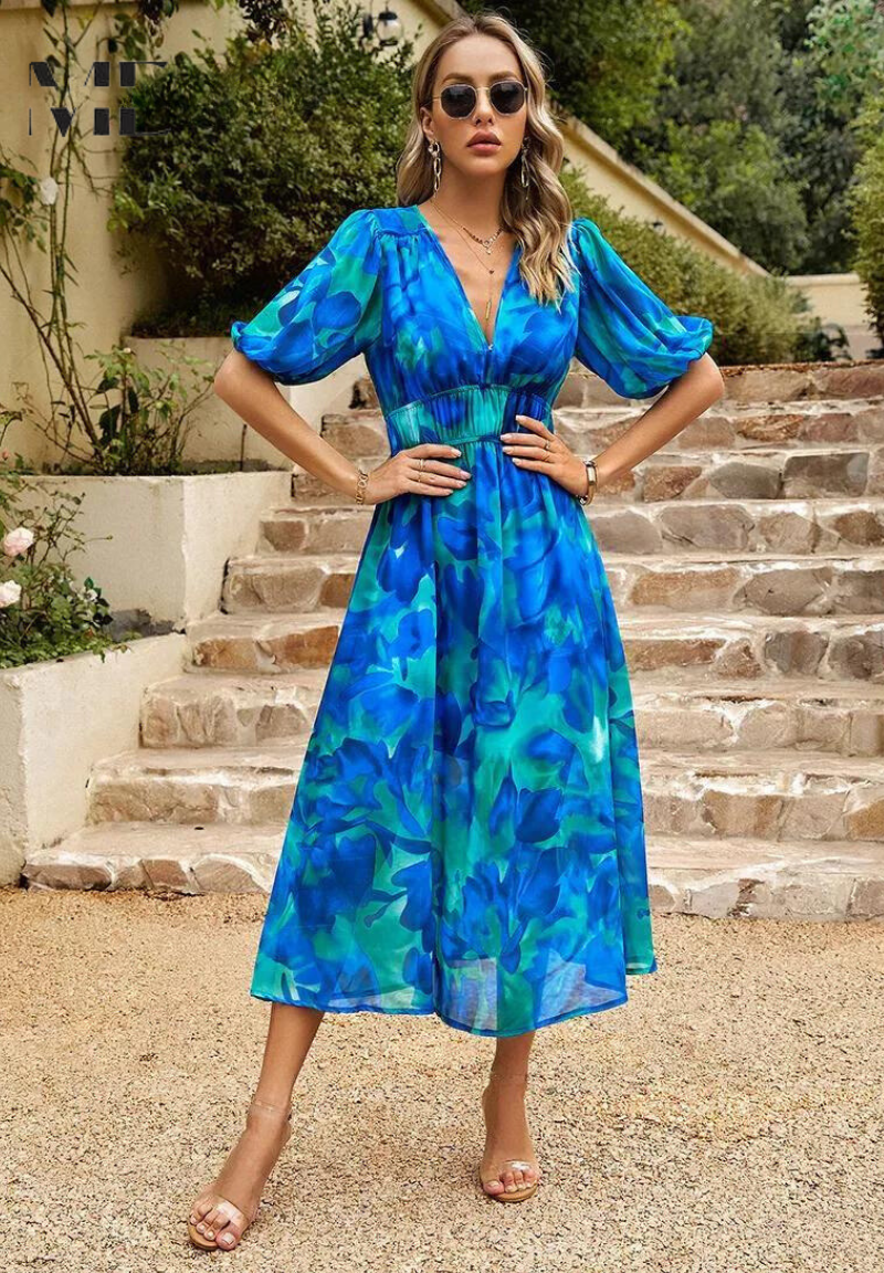 Feminine summer floral midi dress featuring puff sleeves, V-neck, and a flattering A-line silhouette.