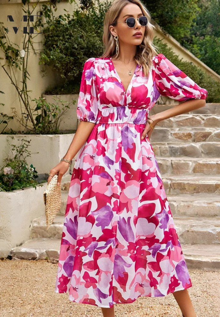Stylish spring floral midi dress with puff sleeves, V-neck, and an elegant A-line cut for women.