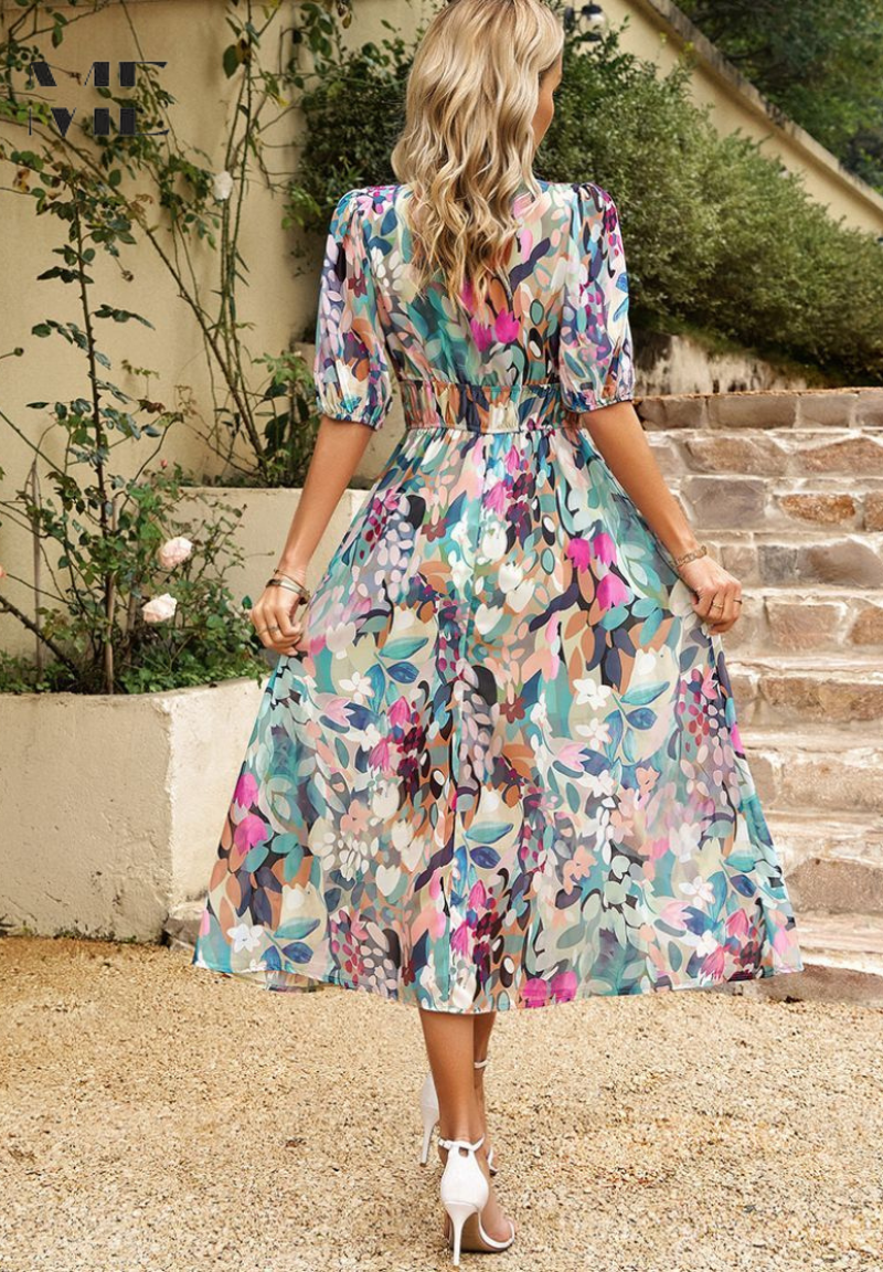 Women's summer floral midi dress with puff sleeves, A-line cut, perfect for vacation.