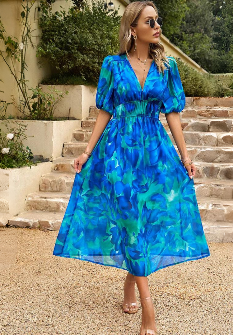 Stylish women's floral print midi dress featuring puff sleeves, V-neck, ideal for summer.