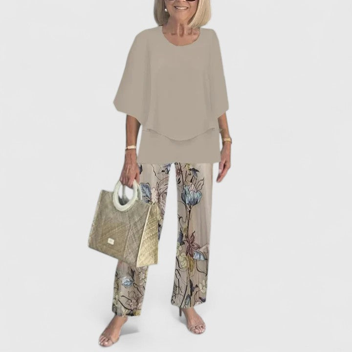 Elegant floral print women's two-piece set with chiffon layered top and wide-leg pants.