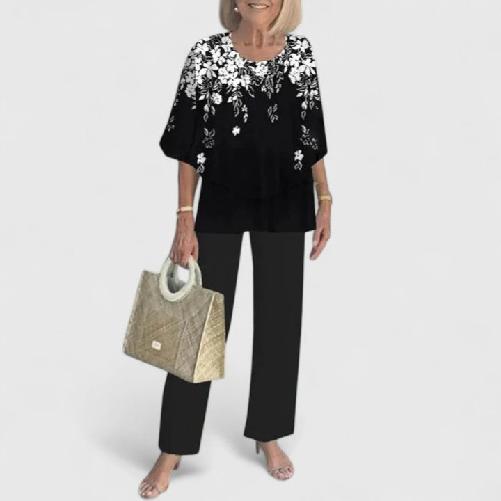 Elegant women's floral outfit: chiffon top and wide-leg pants set.