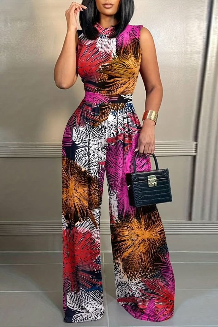 Vibrant floral pattern on an elegant sleeveless women's jumpsuit. Chic one-piece ideal for spring fashion, parties & vacation.
