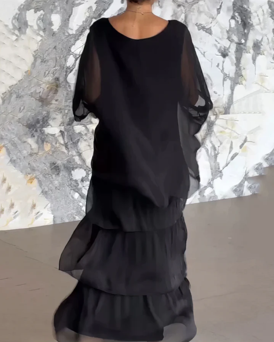 Graceful women's maxi dress, long and flowing, suitable for summer evening wear.