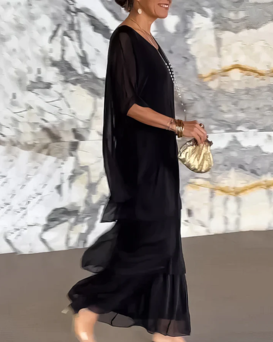 Summer-ready women's long maxi dress, flowing fabric for elegant party wear.