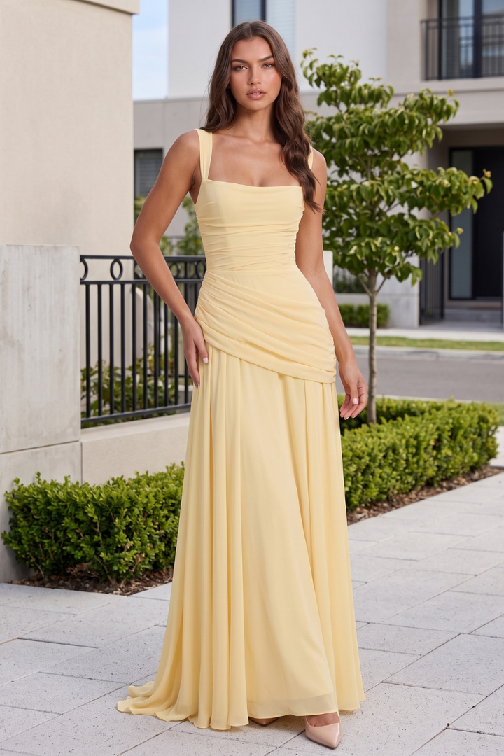 Burgundy elegant flowing maxi dress, women's sophisticated evening or formal attire.