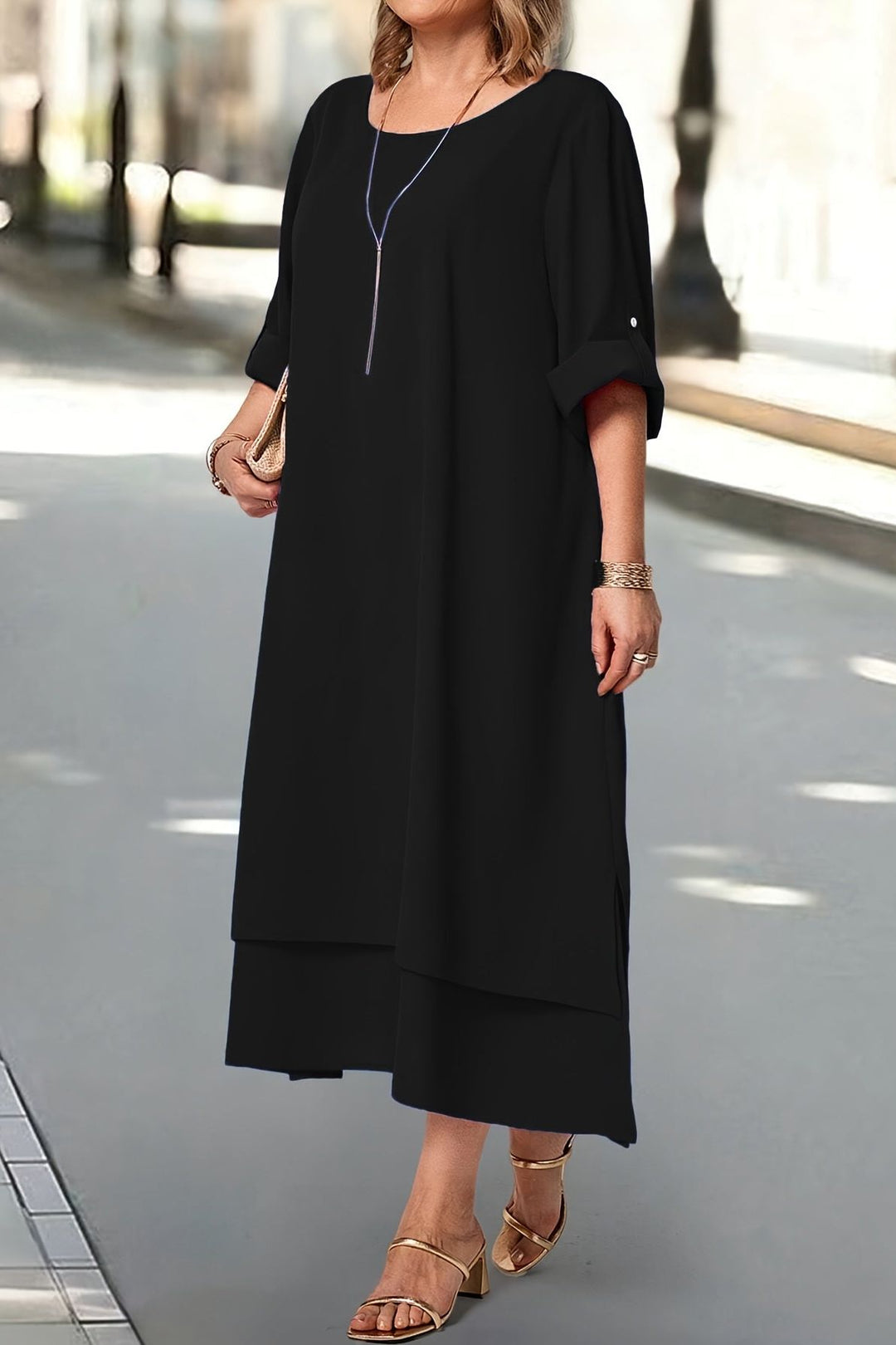 Full-length elegant women's maxi dress in a flowing silhouette, perfect for formal evening events.