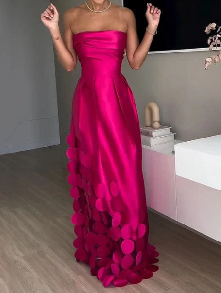 Women's fuchsia strapless maxi wedding guest dress. A-line evening gown, ideal for formal events & special occasions.