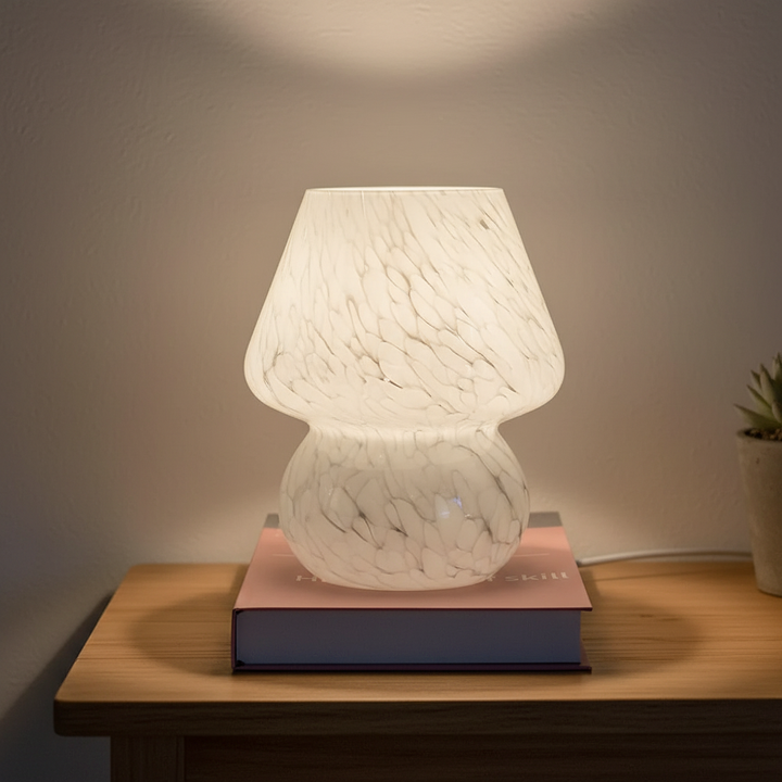 Elegant glass mushroom table lamp, a modern home decor accent light for living rooms.