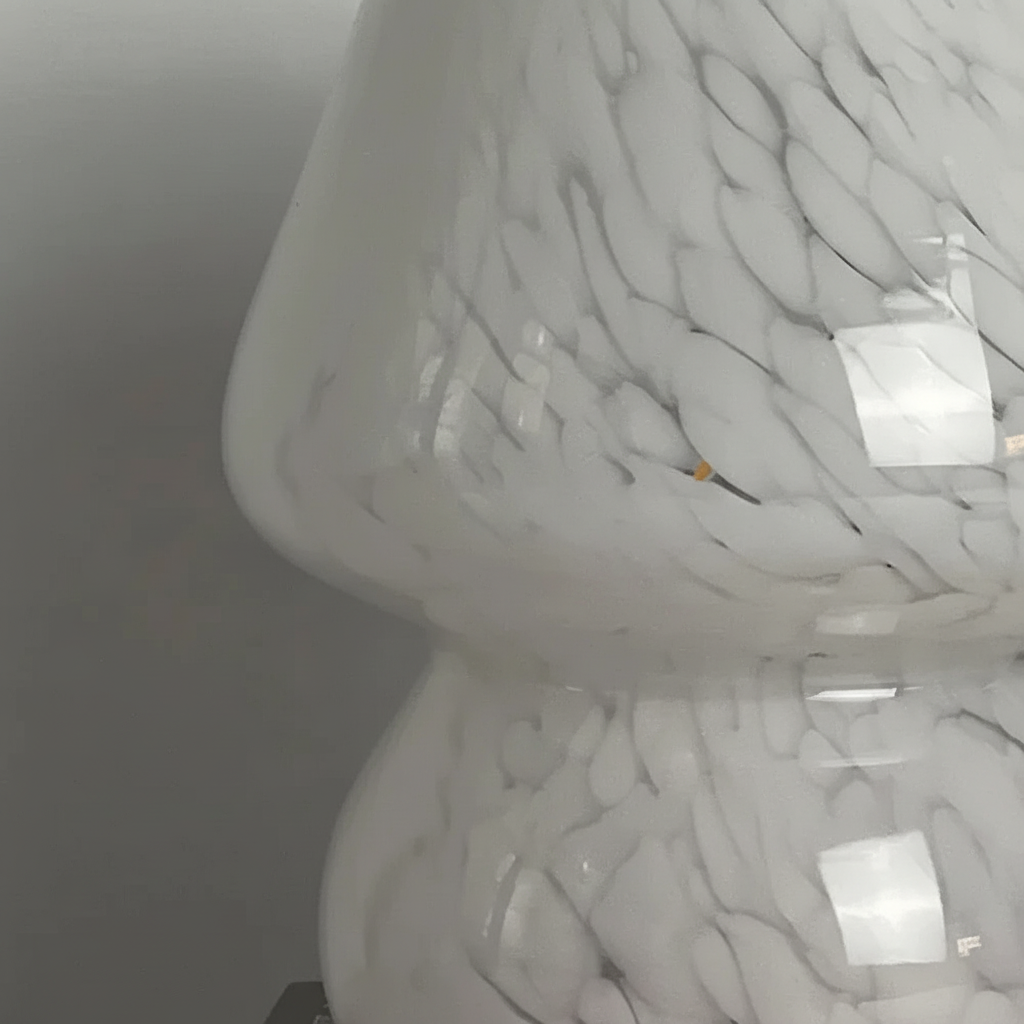 Unique glass mushroom table lamp, providing warm mood lighting for any modern interior.
