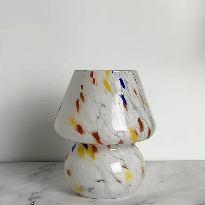 Accent light: Stylish glass mushroom table lamp with unique design for aesthetic spaces.