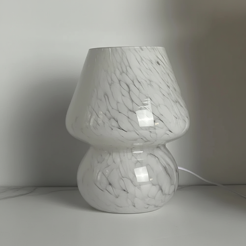 Chic glass mushroom table lamp, enhancing home decor with its unique aesthetic.