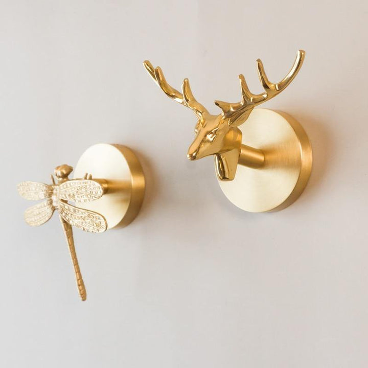Stylish animal wall hooks with a luxurious gold finish for modern homes.
