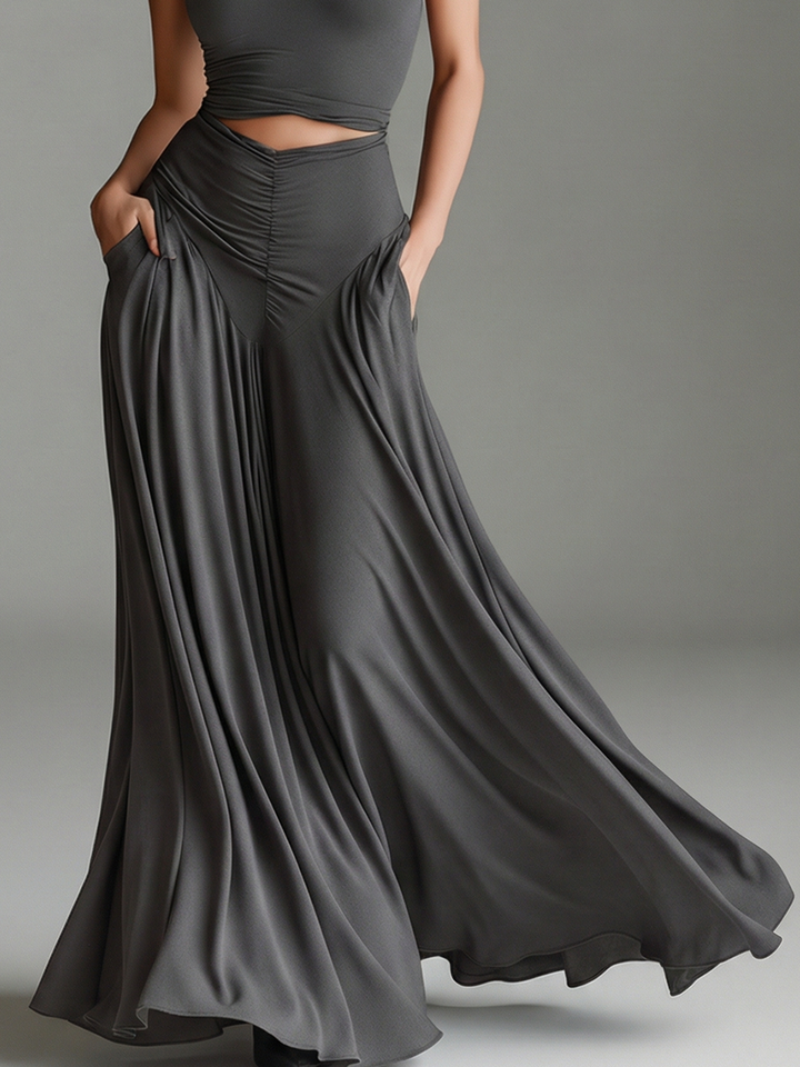 Elegant gray formal halter maxi dress, perfect for evening events, with a flattering cutout waist.