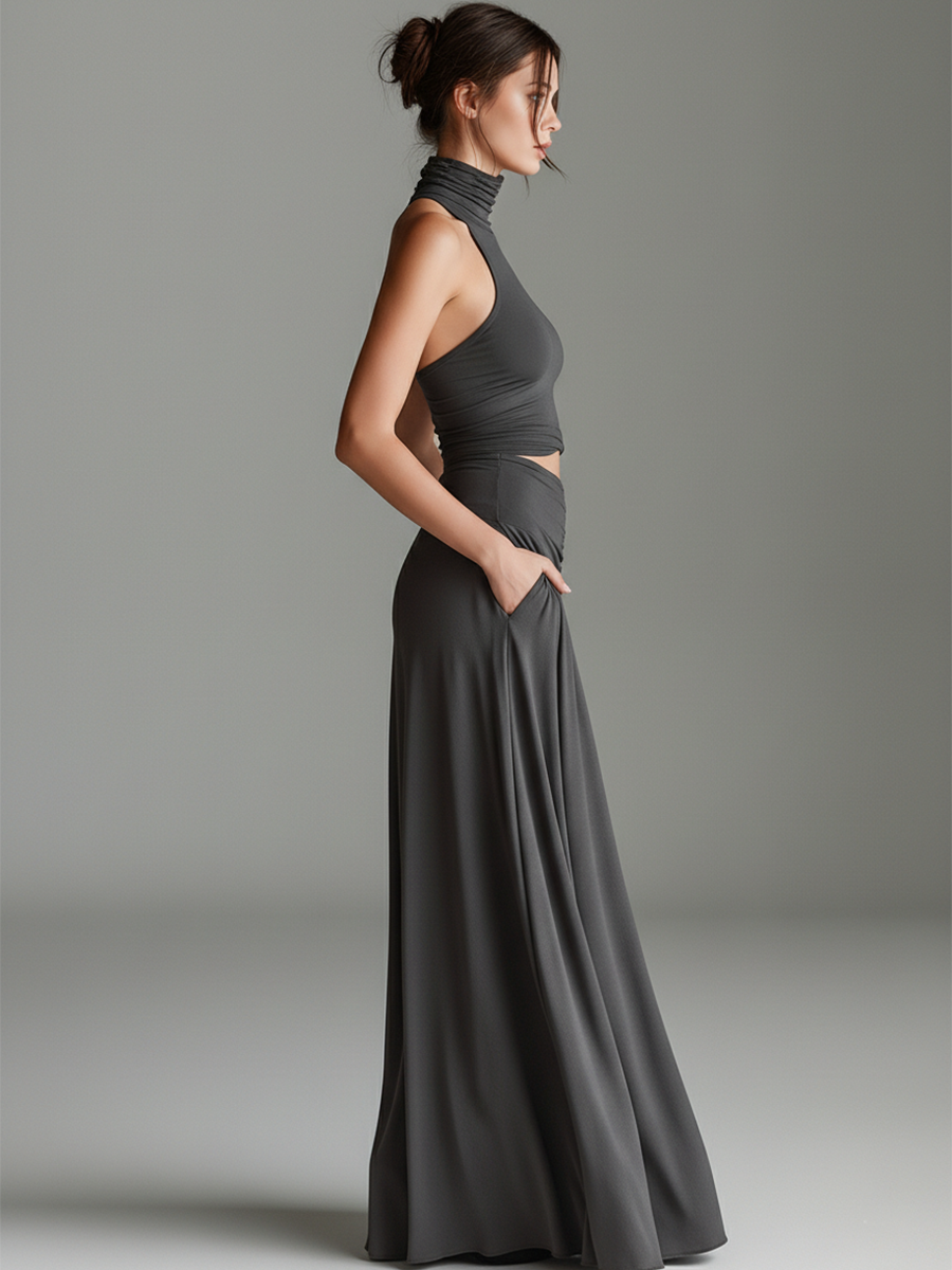 Women's gray halter maxi dress. Elegant formal wear with a unique cutout waist and ruched details.