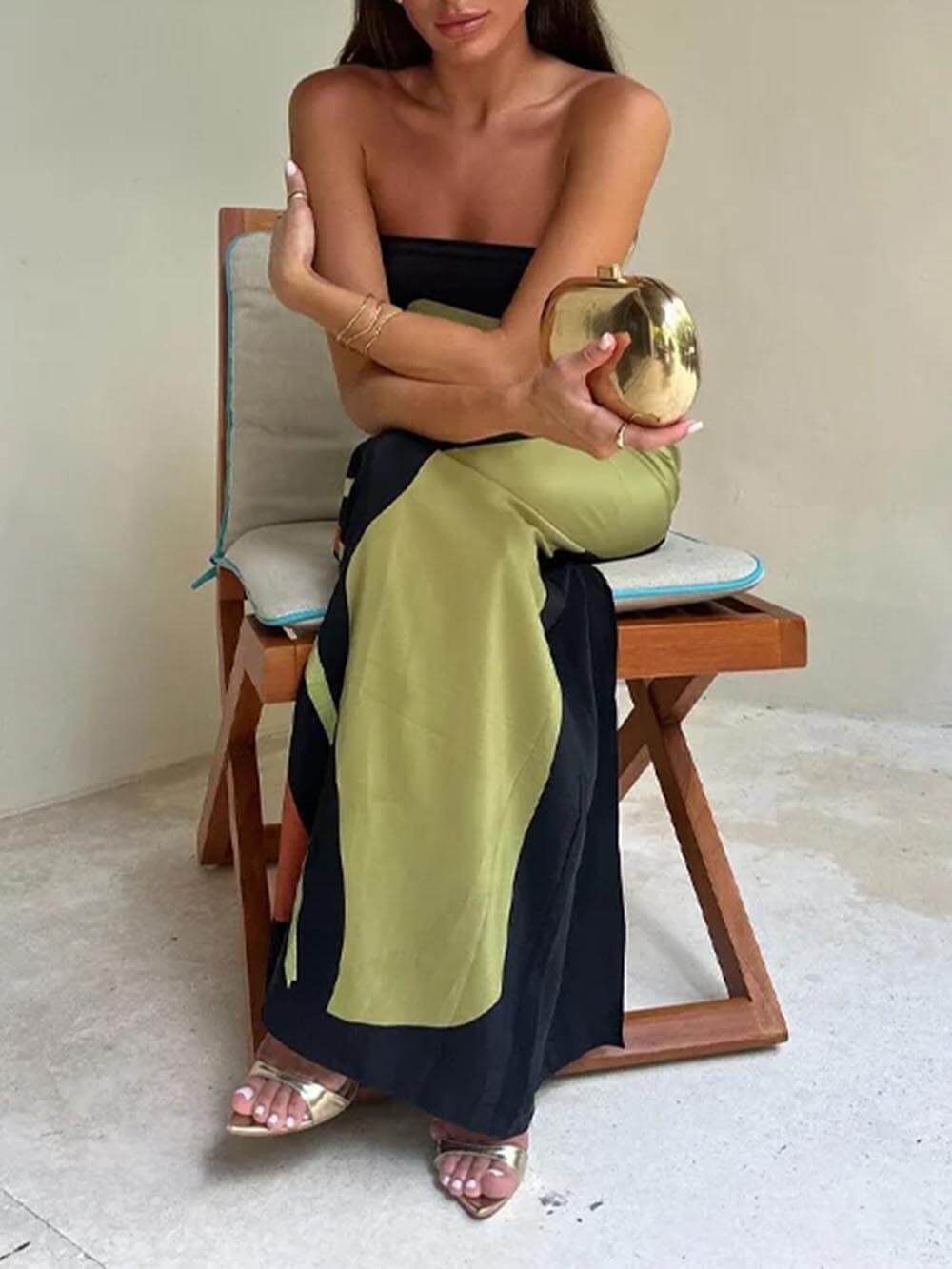 Women's sleeveless green maxi sundress, ideal for beachwear, vacation outfits, or relaxed summer days.