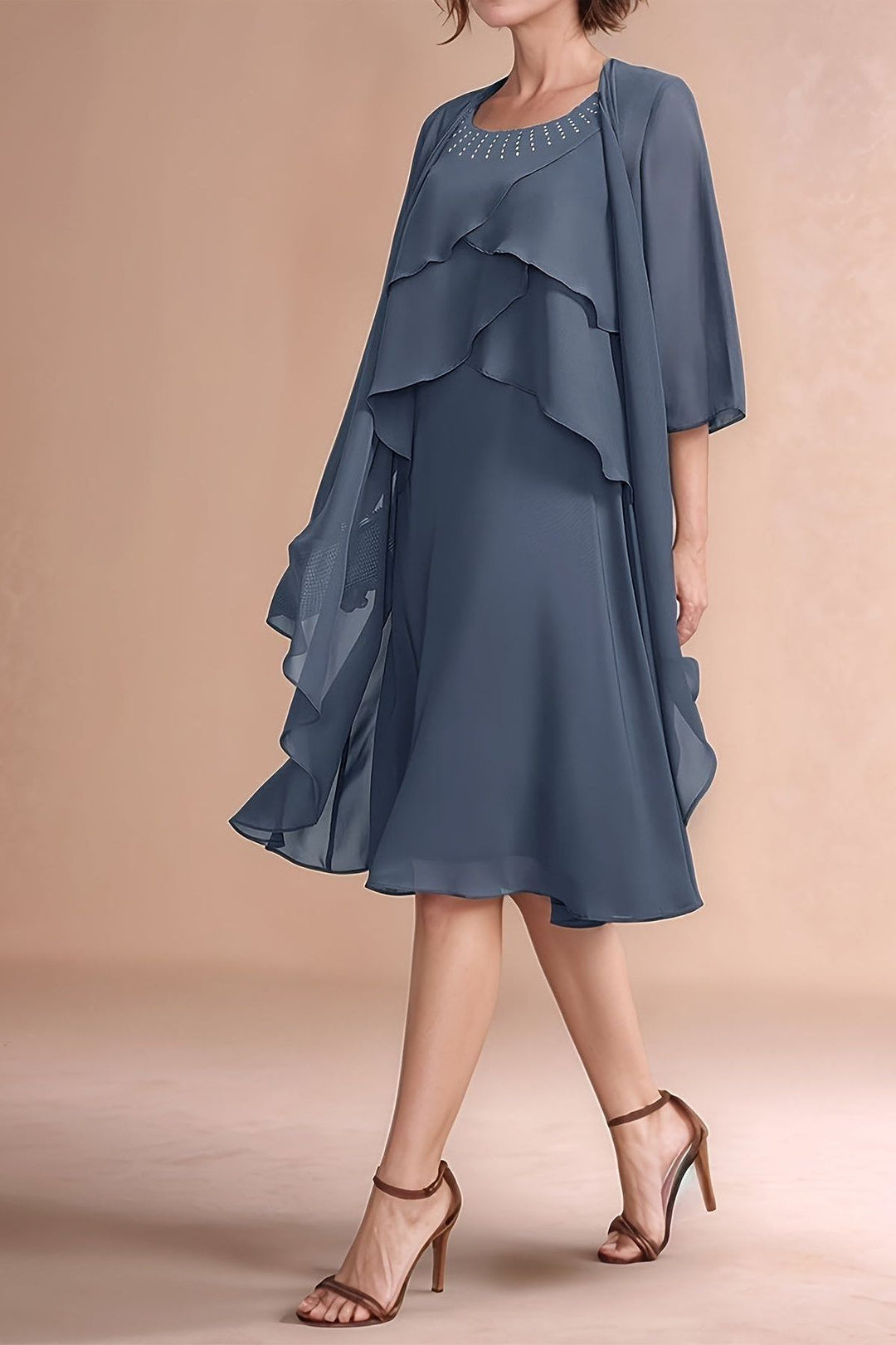 Women's graceful grey midi dress with elegant pleats, ideal for parties & special occasions. Stylish and comfortable.