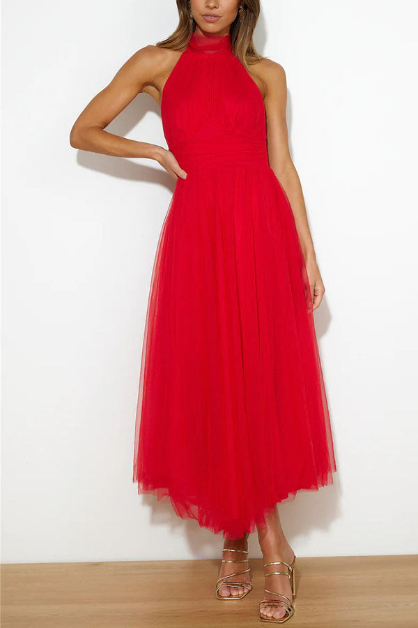 Women's chic halter neck maxi dress, perfect for formal events, evening wear, and wedding guest attire.