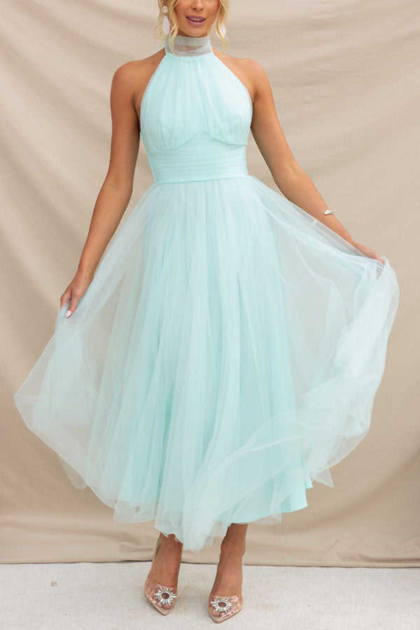 Women's elegant halter maxi dress, a stylish formal gown perfect for weddings and sophisticated events.