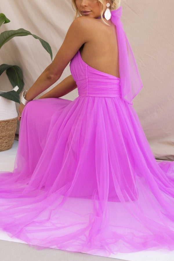 Women's elegant halter maxi dress, a beautiful long gown, perfect as a wedding guest dress.