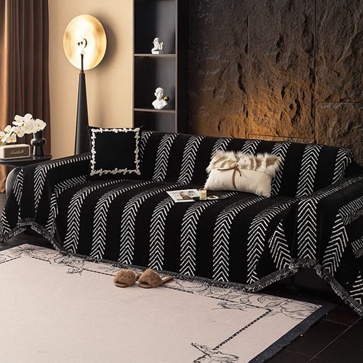 Warm and cozy chenille throw cover featuring a subtle herringbone design, enhancing home comfort.