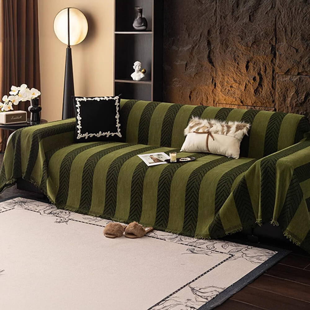 Decorative herringbone chenille couch throw in a muted tone, offering a fresh update for furniture.