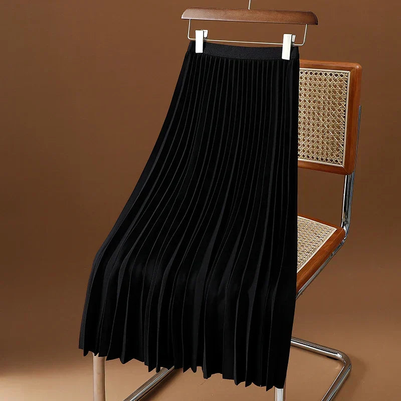 Flowy high waist pleated midi skirt, adding an elegant touch to women's spring/fall outfits.