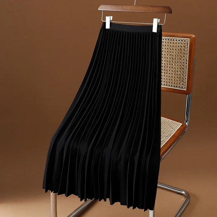 Flowy high waist pleated midi skirt, adding an elegant touch to women's spring/fall outfits.