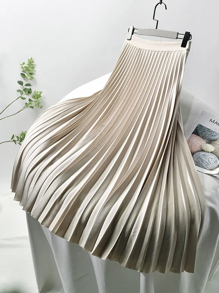 Stylish women's high waist pleated midi skirt. Ideal for elegant spring & fall fashion.